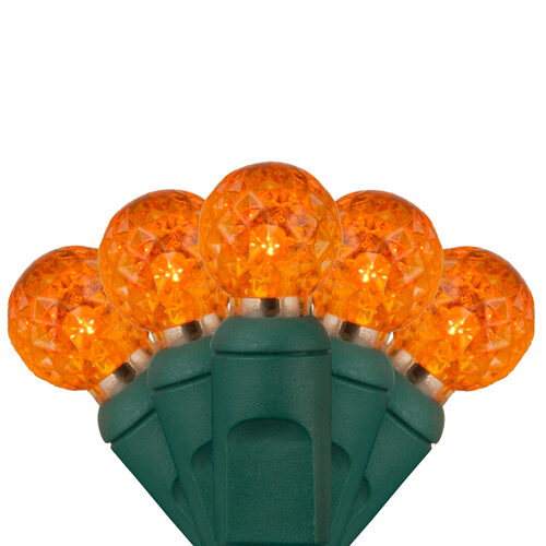 70 G12 Amber LED String Lights, Green Wire, 4" Spacing
