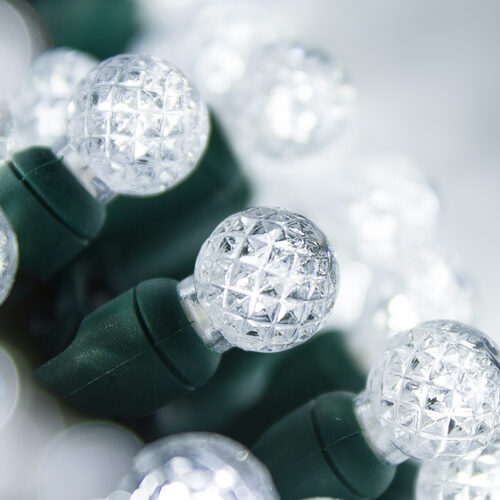 70 G12 Cool White LED String Lights, Green Wire, 4" Spacing