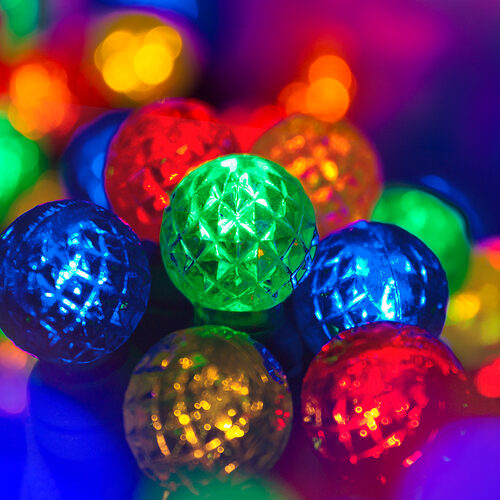 70 G12 Multi Color LED String Lights, Green Wire, 4" Spacing