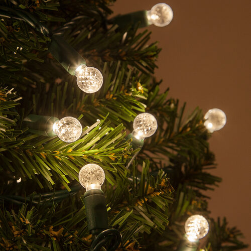 70 G12 Warm White LED String Lights, Green Wire, 4" Spacing